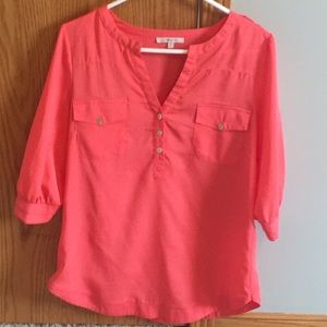 Three quarter length coral top